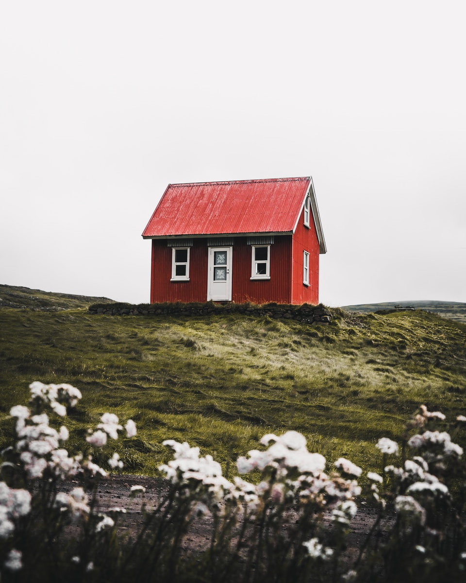Schattingen red and white house surround green grass field